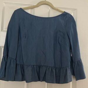 Bebe blouse 3/4 sleeve with silver buttons in the back